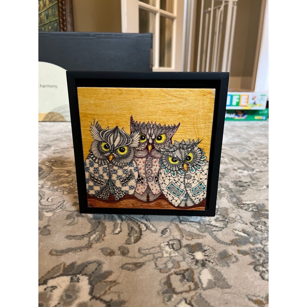 Zentangle owls on wood